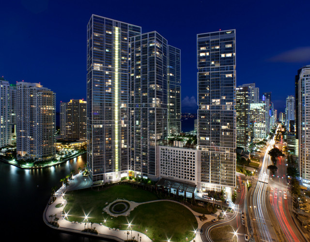 W-Miami-hotel,-Miami-Circle-historic-landmark-and-Brickell-Ave-at-night.jpg