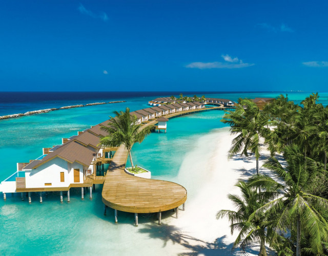 ATMOSPHERE-KANIFUSHI-MALDIVES---AERIAL-VIEW---WATER-VILLA-JETTY-01-(1).jpg