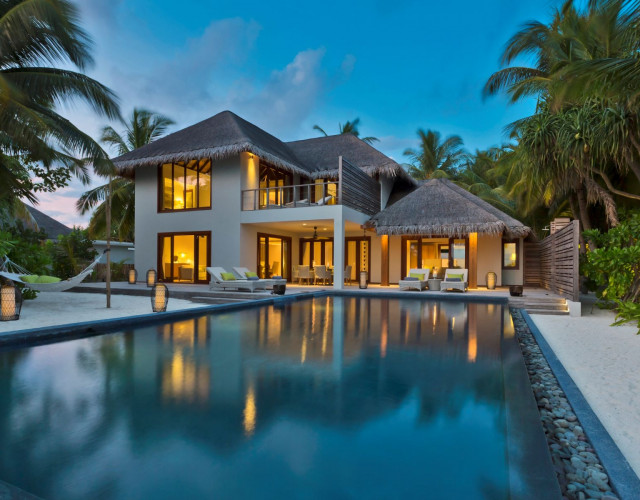 Two-Bedrooms-Beach-Pool-Residence-Exterior-at-twilight.jpg